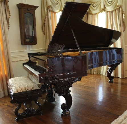 Antique grand store piano